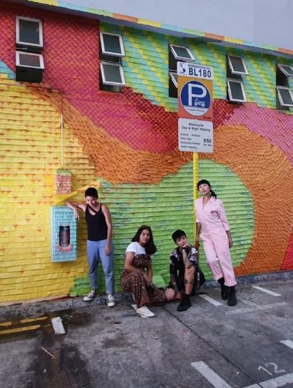 post-it-Artist-Trio-and-assistant-against-the-full-mural-wall