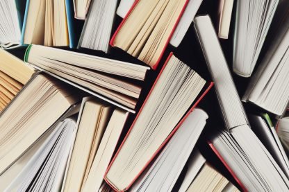 many-books-textured-background-top-view