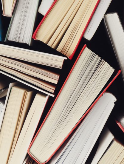 many-books-textured-background-top-view